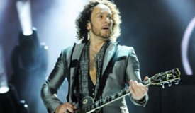 Гитарист Def Leppard поборол рак благодаря концертам